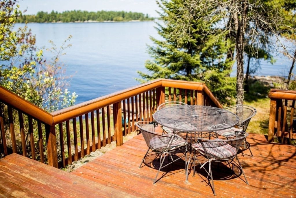 Muskie Lodge patio with table and view of Lake Kabetogama.