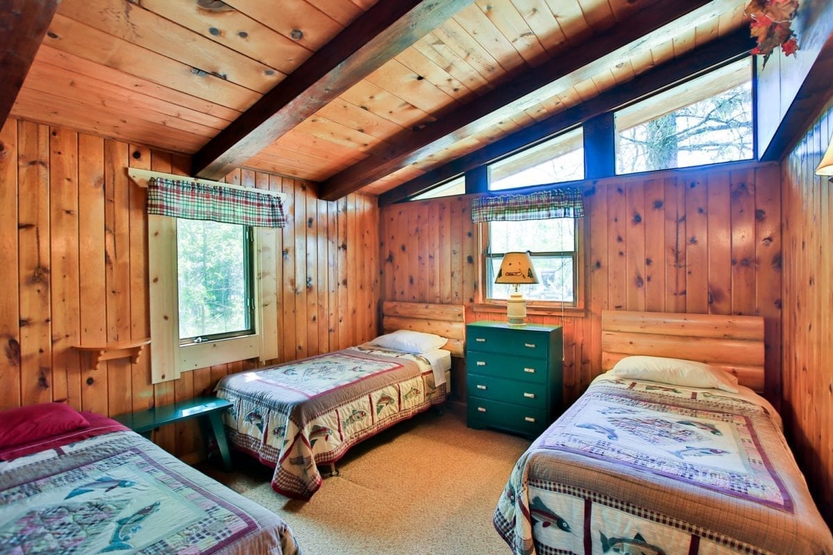 Northern Cabin with three single beds.