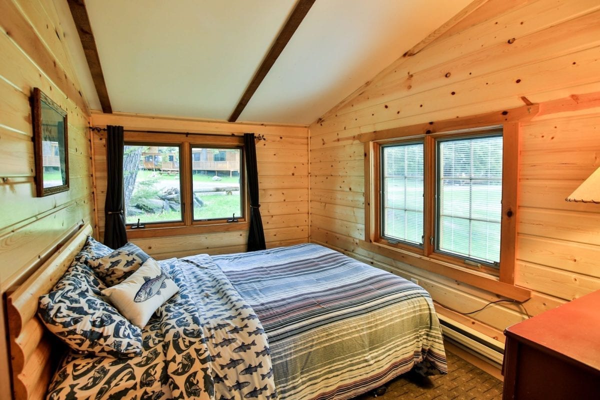 Firestone Log Lodge queen bedroom.
