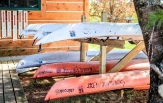 Canoes on racks.